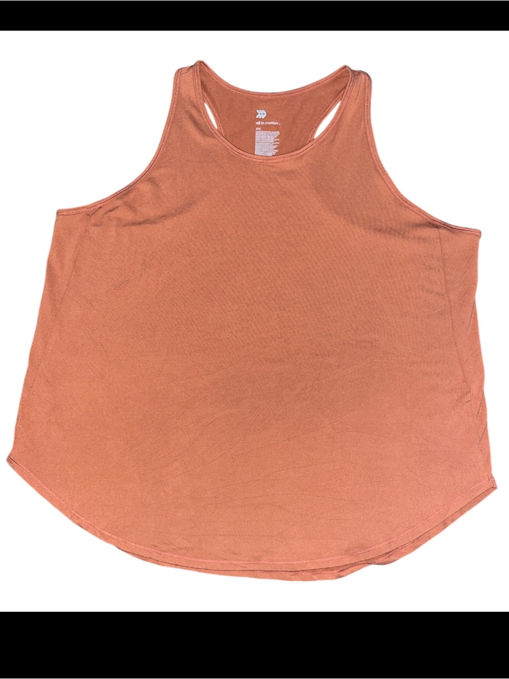 All in motion rust colored or terracotta-shaded women’s racerback tank top